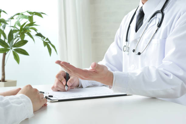Doctor and patient in medical consultation room